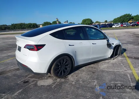 2022 Tesla Model Y из США, поврежденный, VIN 7SAYGAEEXNF468922